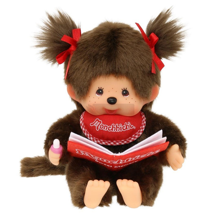 Małpka siedząca i czytająca