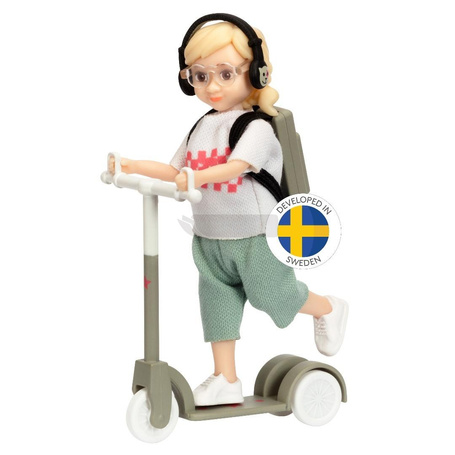 Lalka dziewczynka na hulajnodze