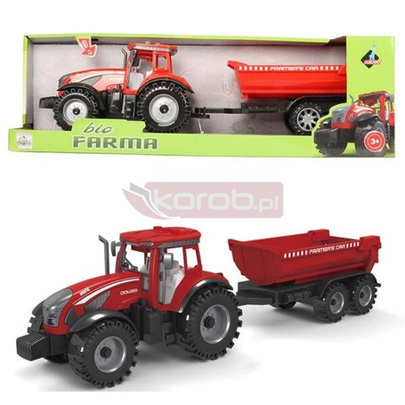 Traktor z czerwoną przyczepą