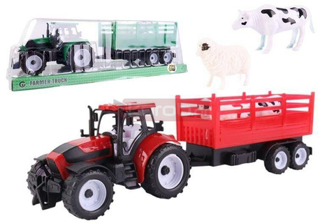 Traktor z przyczepą burtową i zwierzętami mix